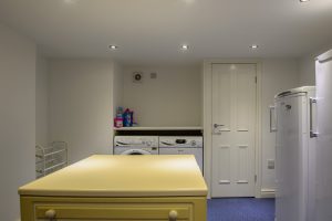 Cellar conversion with utility area for washing machine and dryer. Moorland Road, Didsbury, Greater Manchester