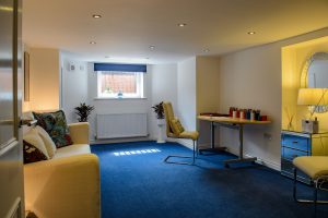 Basement Conversion into an office with seating and a desk. Moorland Road, Didsbury, Greater Manchester