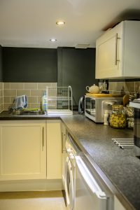 Orchard Street, Didsbury - Basement conversion utility room with washing machine and storage