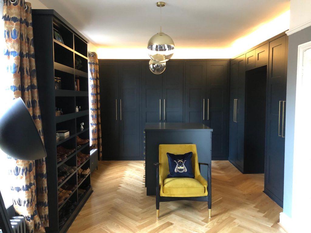 Navy Wardobe with storage and seat -Loft Conversion Manchester - Clarendon Court, Monton