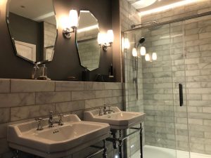 Bathroom Image with Double sink, Shower, mirror and lighting - Loft Conversion Clarendon Court Greater Manchester